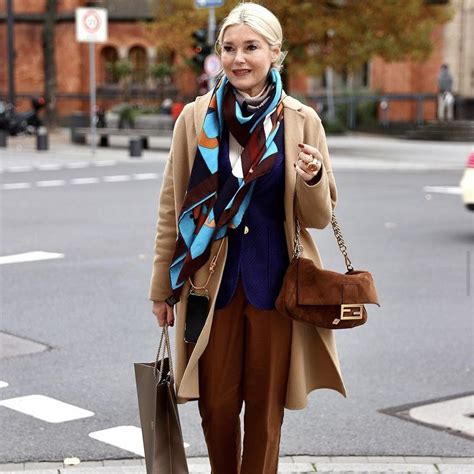 different ways to wear hermes scarf|hermes scarf street style.